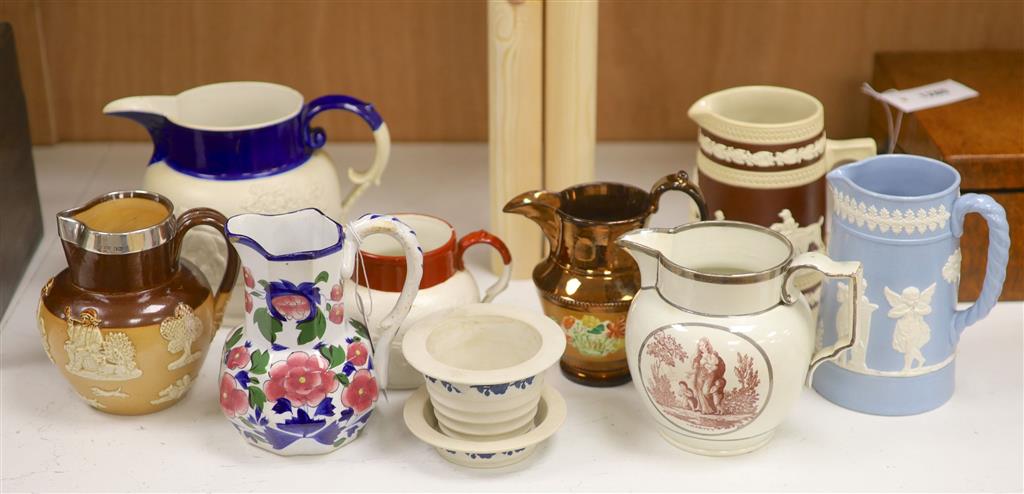 A Royal Doulton Lambeth silver rimmed jug and other various jugs including Copeland, lustreware etc.